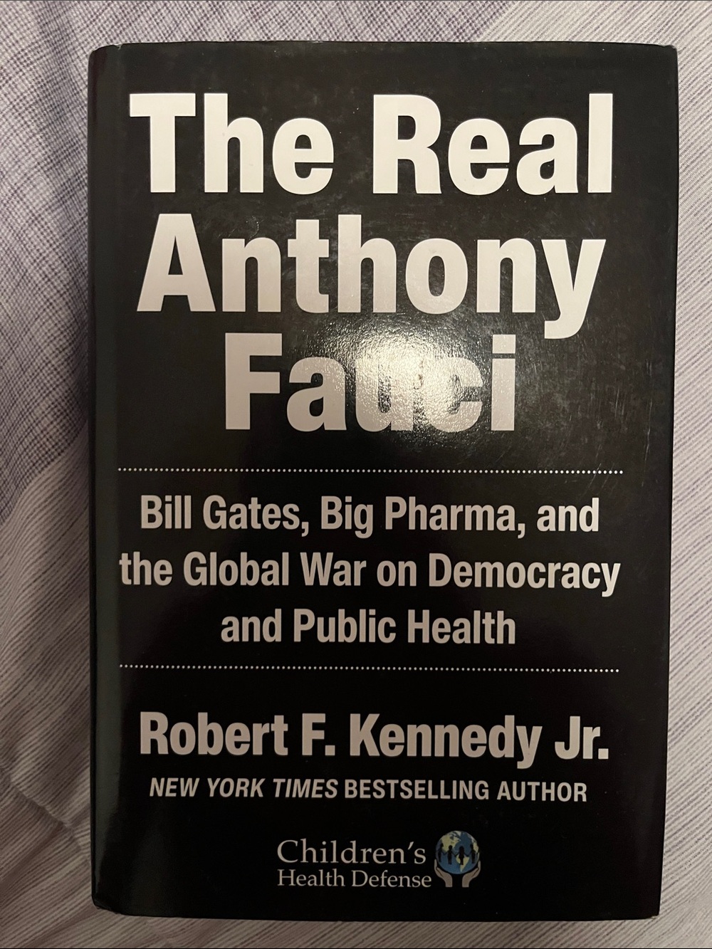 The Real Anthony Fauci - Black Hardcover Book